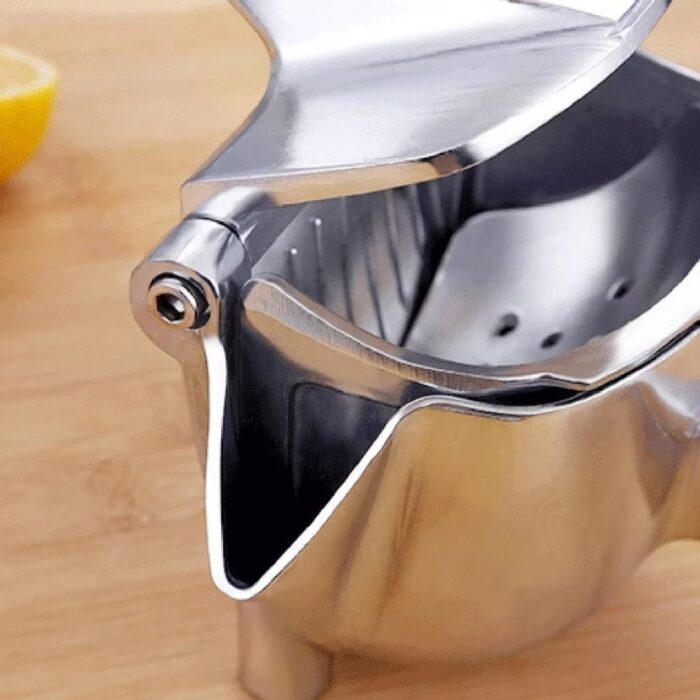 Exprimidor manual de frutas en aluminio - Imagen 3